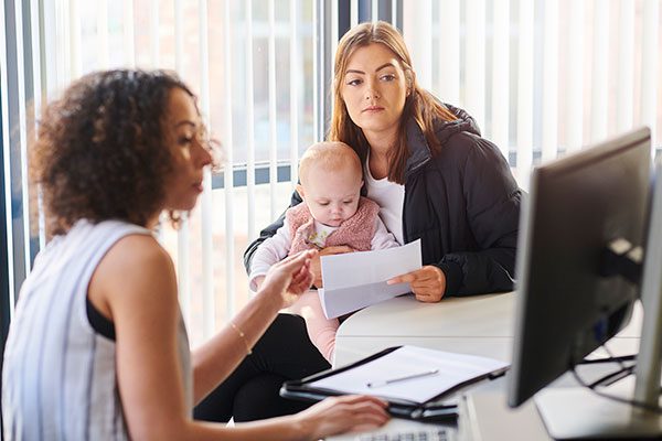 Young mother receiving career advice